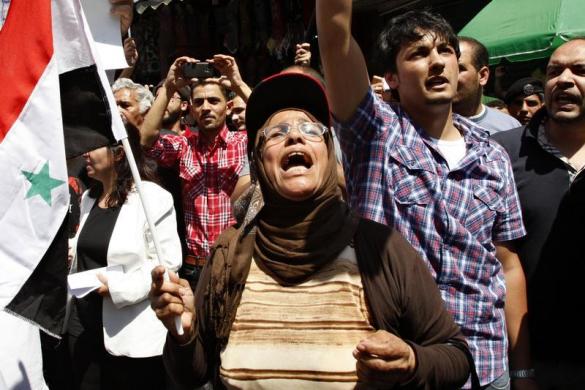 Khắp nơi phản chiến, ủng hộ Syria ảnh 9