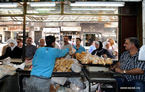 Cuộc sống trong bom đạn của người Syria ảnh 6