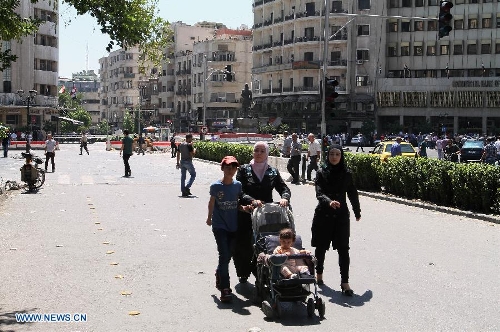 Cuộc sống trong bom đạn của người Syria ảnh 9