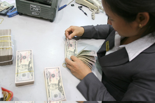Cho vay ngoại tệ giảm ảnh 1