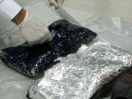 Giấu 5 kg ma túy đá trong gói chè ảnh 1