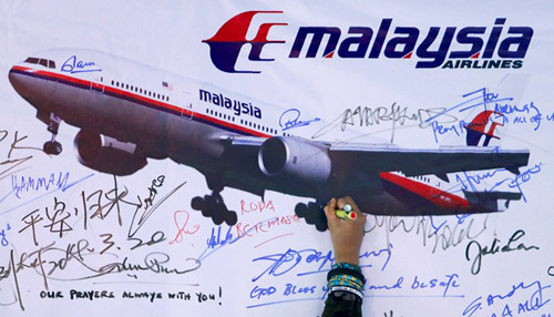 Bắt hai nghi can rút tài khoản ngân hàng của nạn nhân MH370 ảnh 1