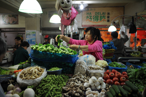 Trung Quốc dự báo GDP giảm 0,4 điểm % ảnh 1