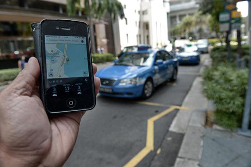 Singapore thắt chặt kiểm soát ứng dụng 'vẫy taxi' ảnh 1