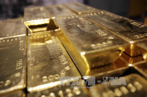 Giá vàng khép lại năm 2014 ở mức gần 1.200 USD/ounce ảnh 1