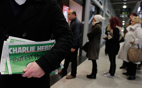 Báo Nam Phi xin lỗi vì đăng lại biếm họa của Charlie Hebdo ảnh 1