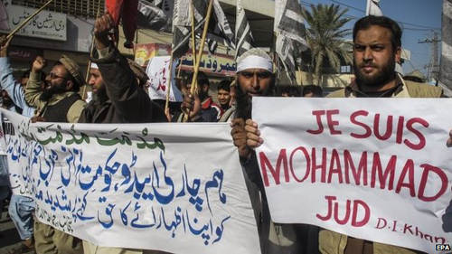 Biểu tình bạo lực phản đối tạp chí Charlie Hebdo ảnh 1