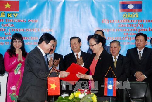 Việt-Lào ký Hiệp định Thương mại song phương ảnh 1
