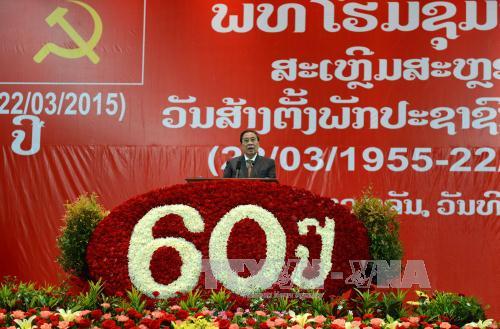 Mít tinh kỉ niệm 60 năm thành lập Đảng NDCM Lào ảnh 1
