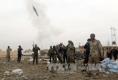 Liên minh quốc tế lần đầu tiên không kích Tikrit chống IS ảnh 1
