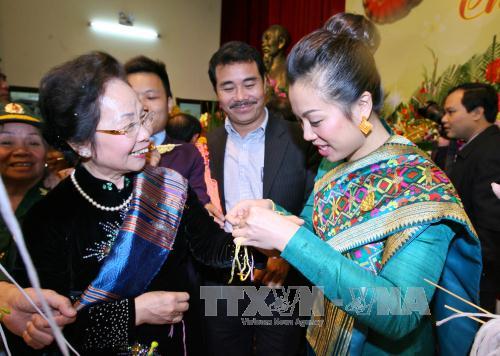 Thắm thiết tình anh em Việt - Lào trong Tết Bun Pi May ảnh 1
