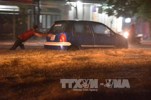 12 người chết và mất tích do mưa lũ sau bão ảnh 1