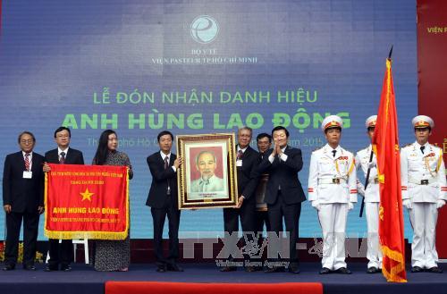 Chủ tịch nước dự lễ trao danh hiệu Anh hùng Lao động cho Viện Pasteur ảnh 1