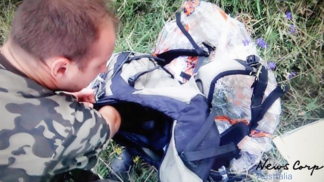 Phe ly khai lục lọi hành lý nạn nhân vụ MH17 ảnh 2