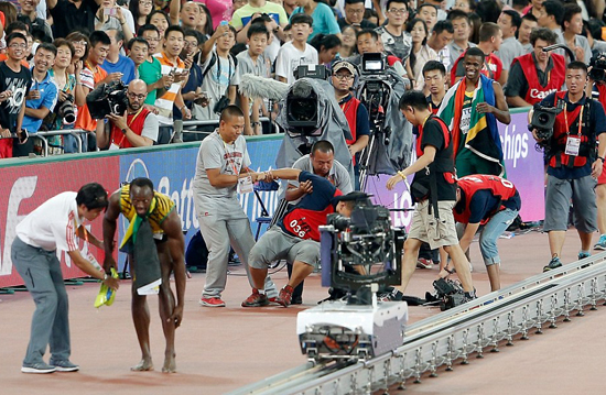 Tai nạn hy hữu của Usain Bolt tại Bắc Kinh ảnh 3