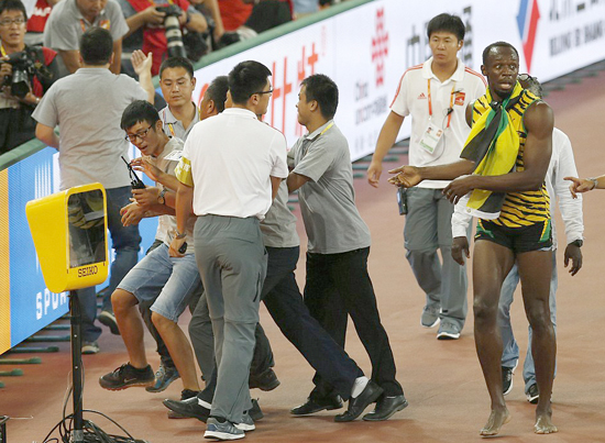 Tai nạn hy hữu của Usain Bolt tại Bắc Kinh ảnh 11