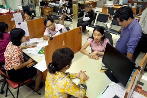 Bỏ con dấu, doanh nghiệp lúng túng ảnh 1