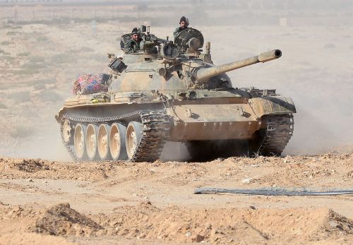 Binh sĩ Syria chiến đấu trên đống đổ nát Palmyra ảnh 1