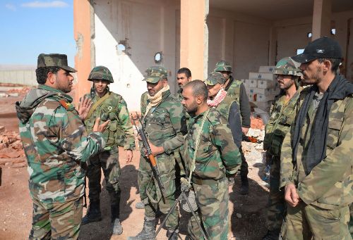 Binh sĩ Syria chiến đấu trên đống đổ nát Palmyra ảnh 3