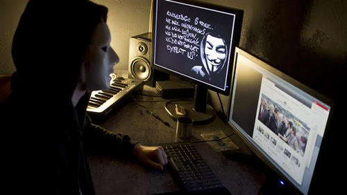 Anonymous cảnh báo IS tấn công Pháp, Mỹ ảnh 1