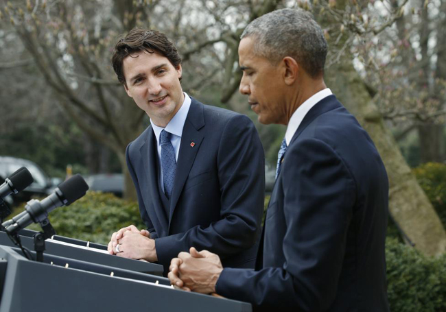 Tình cảm nồng ấm giữa ông Obama và Thủ tướng Canada gây sốt ảnh 3