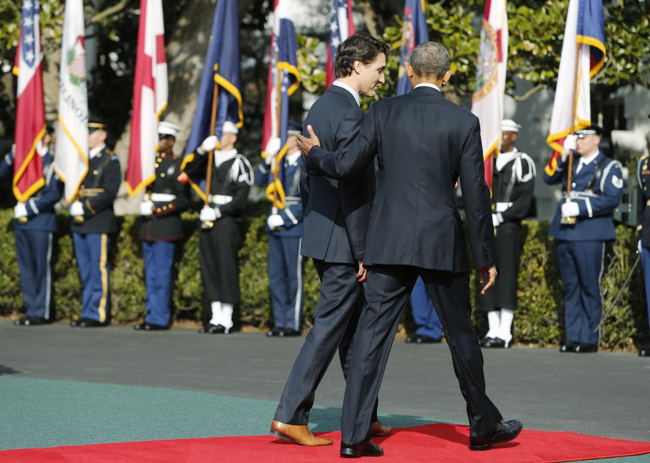 Tình cảm nồng ấm giữa ông Obama và Thủ tướng Canada gây sốt ảnh 8