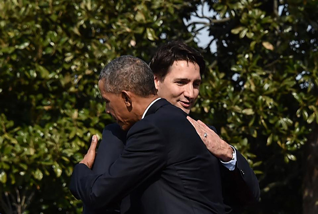 Tình cảm nồng ấm giữa ông Obama và Thủ tướng Canada gây sốt ảnh 9