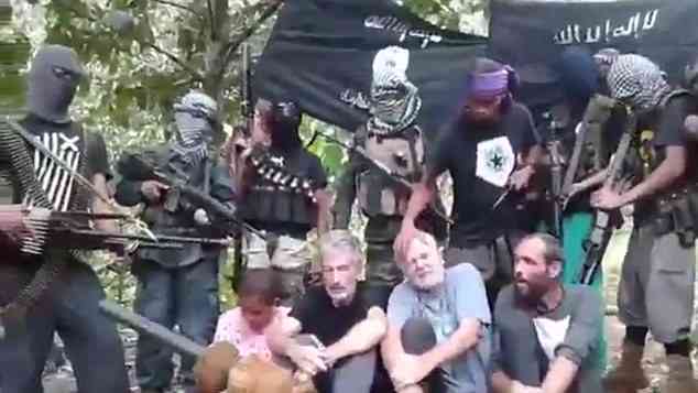 Phiến quân Abu Sayyaf muốn kết thân với IS ảnh 1