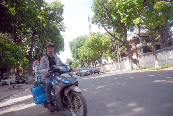 Nhọc nhằn mưu sinh trong nắng nóng 55 độ C ảnh 16