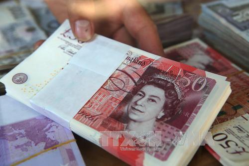Đồng bảng Anh bị "nhiễm độc" trước nguy cơ "Brexit cứng" ảnh 1