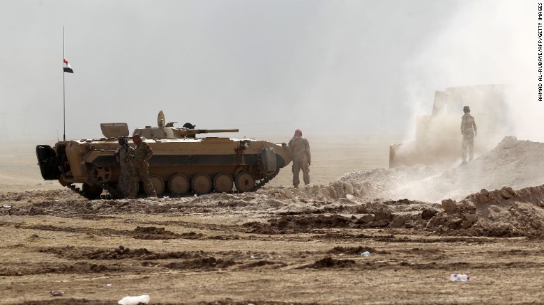 Mosul mịt mù khói lửa trong ngày thứ hai tổng tấn công ảnh 6
