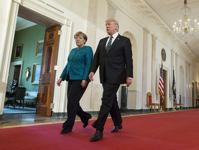 Nhìn lại 100 ngày đầu ông Trump ghi dấu ấn trên cương vị Tổng thống Mỹ ảnh 10