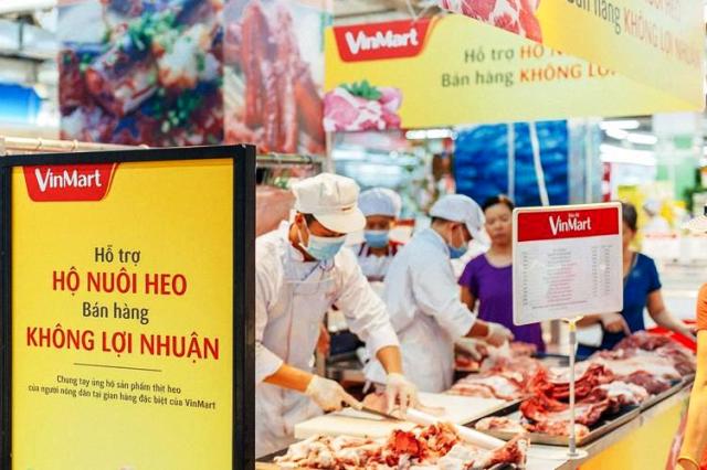Nhiều siêu thị, doanh nghiệp tham gia giải cứu thịt lợn, bán hàng không lợi nhuận ảnh 1