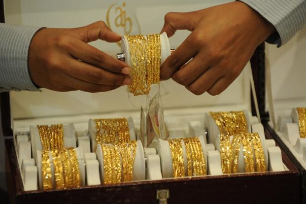 Giá vàng thế giới tăng tuần thứ ba liên tiếp ảnh 1