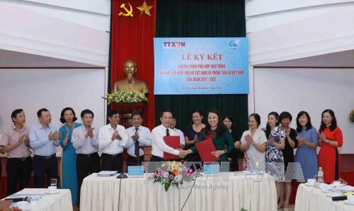 TTXVN và Hội Liên hiệp Phụ nữ Việt Nam phối hợp tuyên truyền ảnh 1