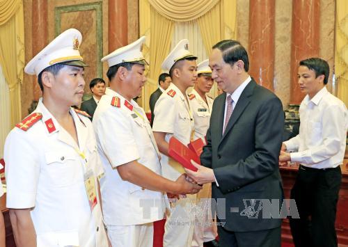 Chủ tịch nước gặp mặt Đoàn đại biểu thương binh, thân nhân liệt sĩ lực lượng Cảnh sát nhân dân ảnh 1