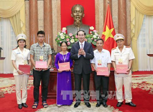 Chủ tịch nước gặp mặt Đoàn đại biểu thương binh, thân nhân liệt sĩ lực lượng Cảnh sát nhân dân ảnh 2