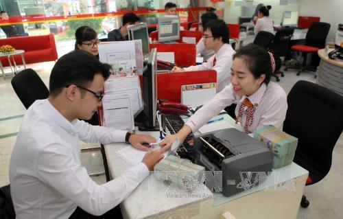 Vì sao lãi suất huy động không giảm ? ảnh 1