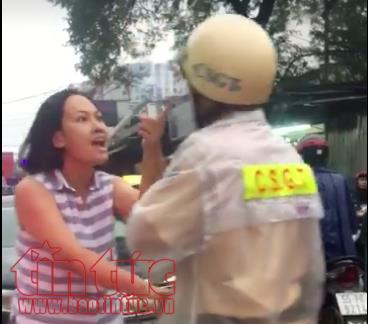 Phẫn nộ cảnh một phụ nữ đi ô tô lấn làn, lăng mạ cảnh sát giao thông ảnh 1