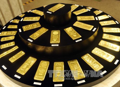 Giá vàng giao ngay lập 'đỉnh' của 6 tuần sau tuyên bố của FED ảnh 1