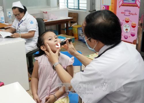 TP. Hồ Chí Minh: Bệnh sốt xuất huyết chưa lui, dịch tay chân miệng lại tới ảnh 1