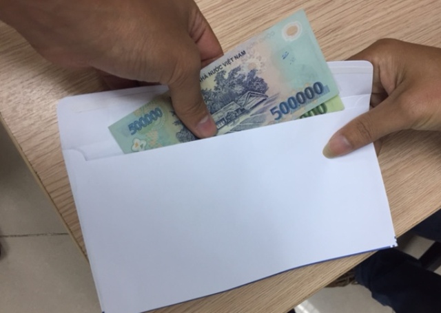 Tham nhũng vặt làm xói mòn lòng tin của nhân dân ảnh 1