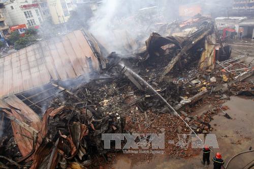 Hiện trường vụ cháy lớn thiêu rụi siêu thị Thành Đô ảnh 6