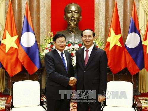 Chủ tịch nước Trần Đại Quang tiếp Thủ tướng Lào Thongloun Sisoulith ảnh 2