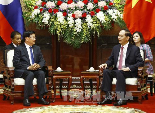 Chủ tịch nước Trần Đại Quang tiếp Thủ tướng Lào Thongloun Sisoulith ảnh 1