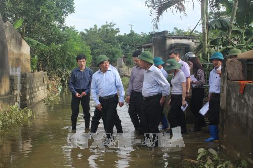 Phó Thủ tướng Phạm Bình Minh làm việc tại Thanh Hóa về công tác khắc phục thiệt hại do mưa lũ ảnh 1