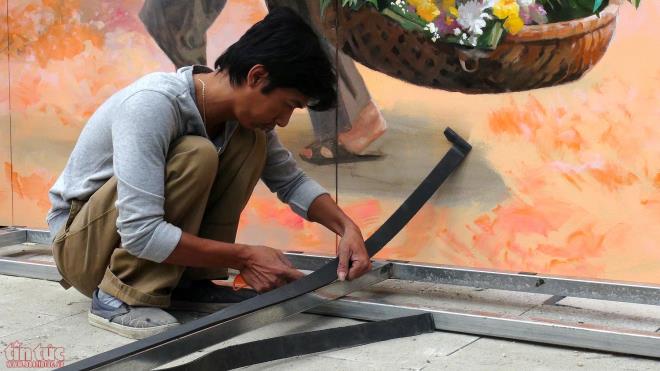 Phố Phùng Hưng khoác 'áo mới' với những tấm bích họa ảnh 5