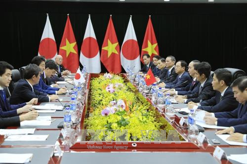 APEC 2017: Chủ tịch nước Trần Đại Quang tiếp Thủ tướng Nhật Bản ảnh 2