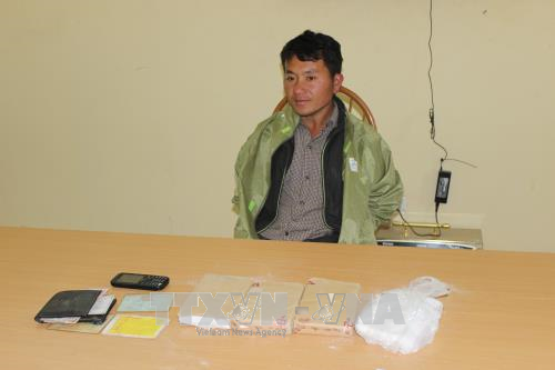 Thu giữ 12 bánh heroin và 1.000 viên ma túy tổng hợp ảnh 1
