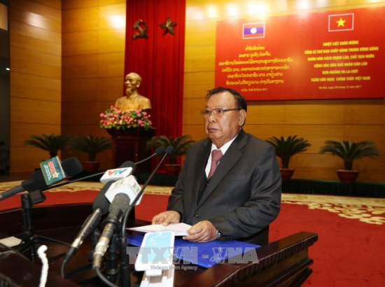Tổng Bí thư, Chủ tịch nước Lào gặp gỡ cựu quân tình nguyện Việt Nam và thế hệ trẻ hai nước ảnh 2